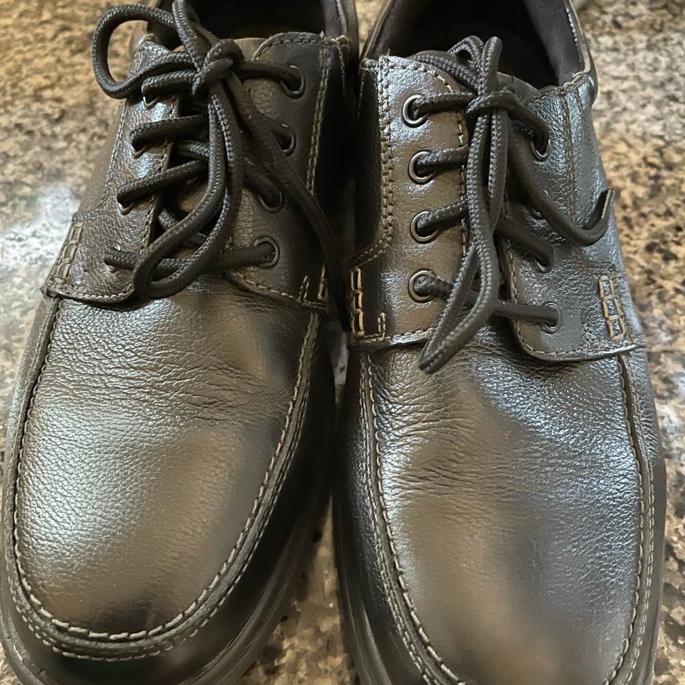 Men’s black Nunn Bush dress shoes .